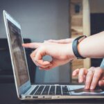 How to Navigate Remote Work Challenges Photo Virtual team meeting